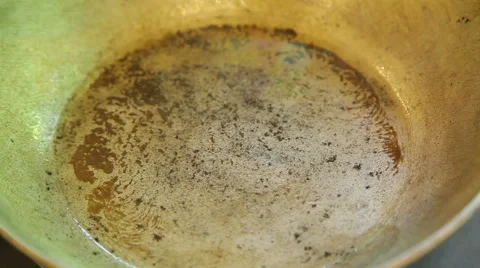 Empty frying pan with oil Stock Footage 40978559