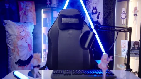 Empty gaming chair moving in anime influencer room with neon lights template 4K Stock Footage 295530272