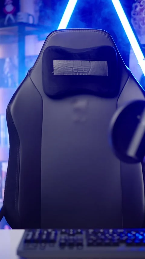 Empty gaming chair moving in anime influencer room with neon lights template Stock Footage 324142844