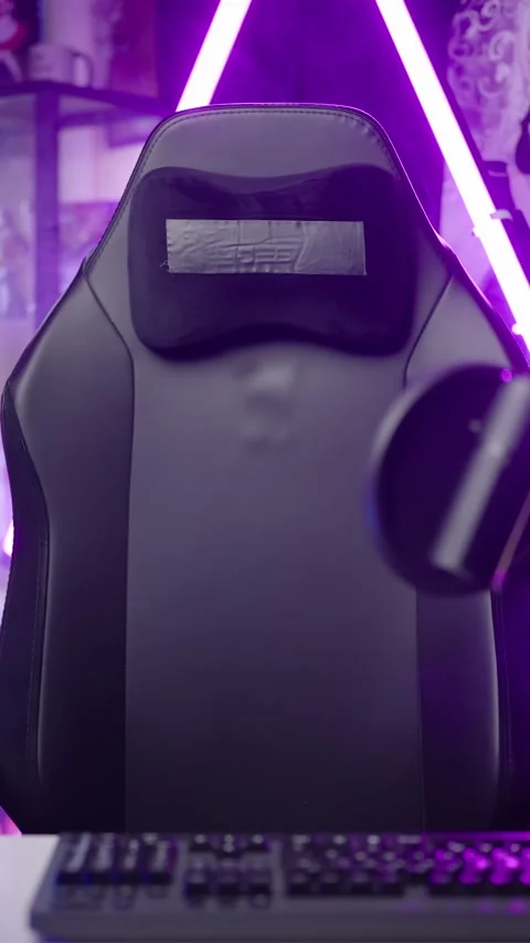 Empty gaming chair moving in anime influencer room pink neon light template Stock Footage 324143048