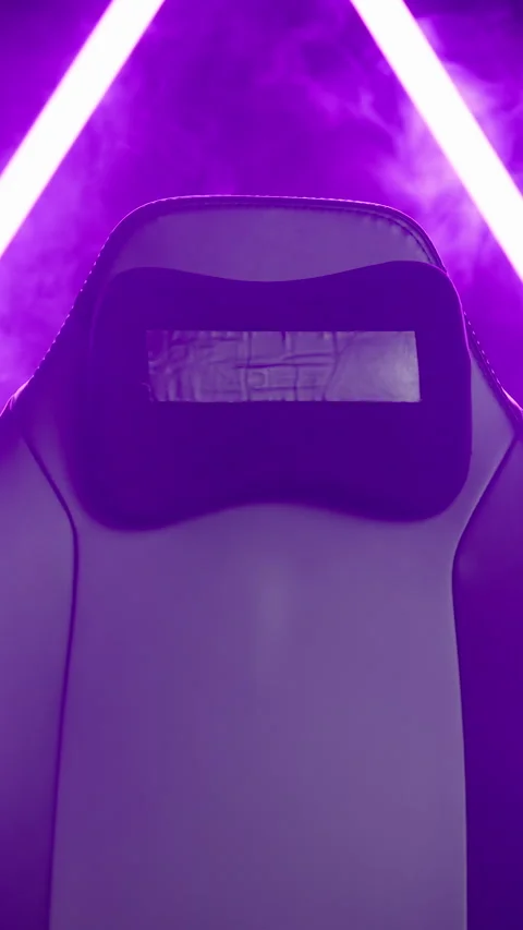Empty gaming chair moving template in pink neon light cyberspace with smoke Stock Footage 324141945