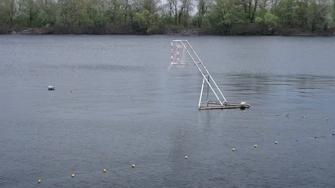 Empty gates for Canoe polo float on the calm river surface Stock-Footage 109208317