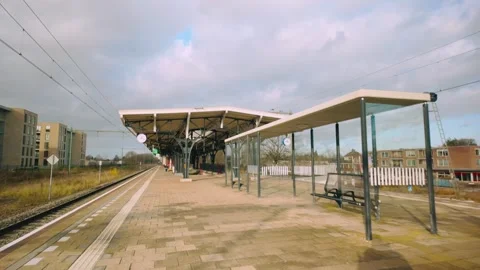 Empty Geldrop Train Station Platform Perspective in Noord-Brabant Netherlands Stock Footage 295928789