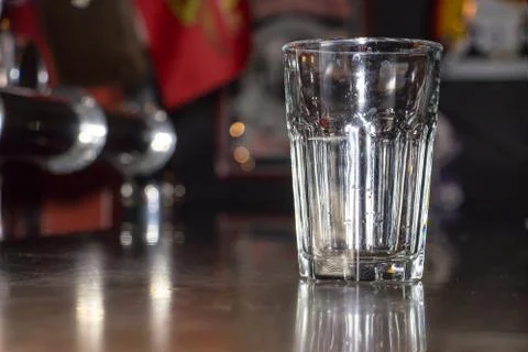 Empty glass on the bar Stock-Fotos