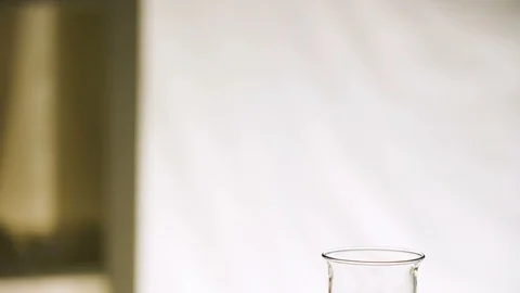 The empty glass beaker on top of the table Video stock 127468252