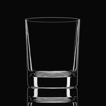 Empty glass on a black background Stock Photos