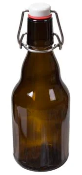Empty glass bottle with the closed cap hold isolated Stock Photos