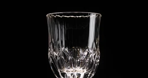 Empty glass closeup over black background. Stock Footage 285449607