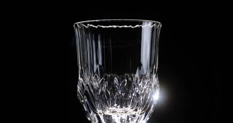 Empty glass closeup over black background. Stock Footage 285457510