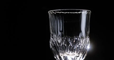 Empty glass closeup over black background. Stock Footage 285457514