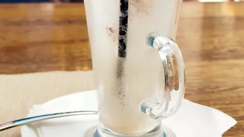 Empty glass coffee cup on table in cafe Video stock 157152305