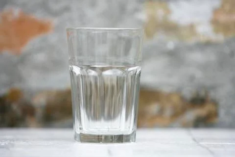 Empty glass cup on the table Stock Photos