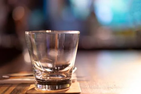 Empty glass that is empty on the table in the restaurant. Stock Photos