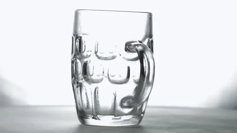 Empty glass goblet with under beer Video stock 154427842