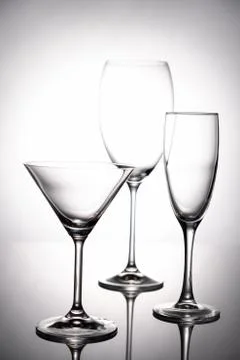 Empty glass goblets set. On a white background abstract Foto stock