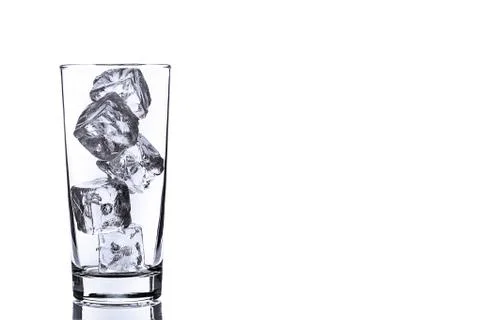 Empty glass with ice cubes Stock Photos