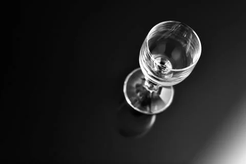 Empty glass isolated on black background Stock Photos