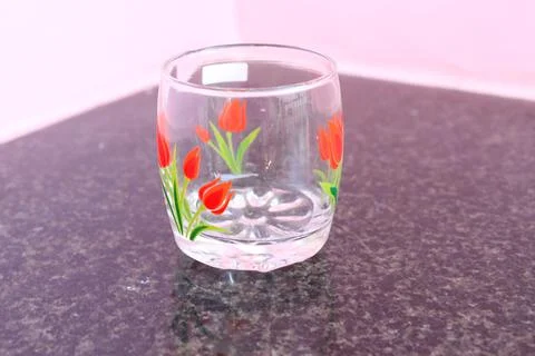 Empty glass isolated on texture background Stock Photos