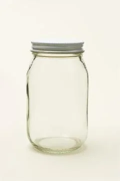 Empty glass jar Stock Photos