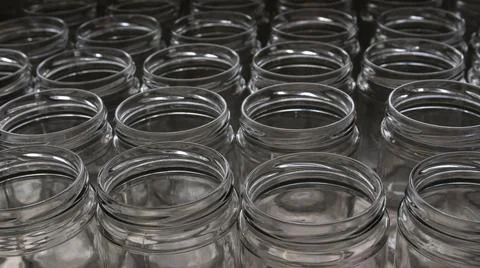 Empty glass jars in the artisanal process of making organic yogurt Stock Photos