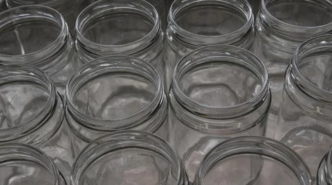 Empty glass jars in the artisanal process of making organic yogurt Stock Photos