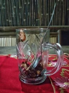 Empty Glass Mug After Drinking Traditional Indonesian Herbal Beverage Stock Photos