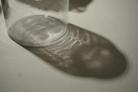 Empty glass shadow Stock Photos