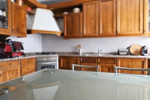 Empty glass table in the kitchen room Stock Photos