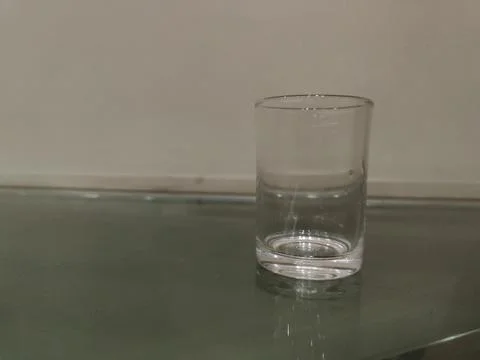 Empty glass on the table. Stock Photos