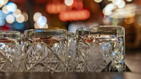Empty glass on the table in the restaurant Stock Photos