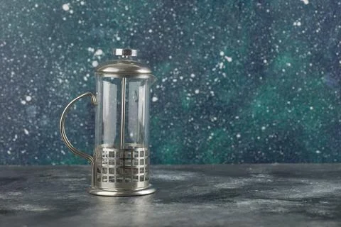 An empty glass teapot on a bright background Stock Photos