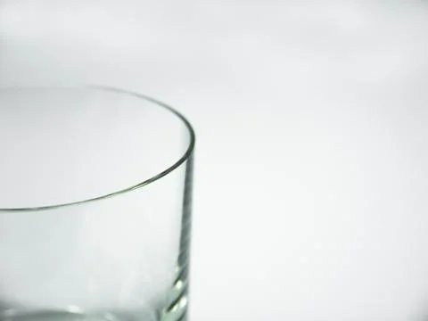 Empty glass on the white background Stock Photos