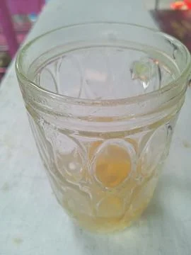 Empty glass on white surface Stock Photos