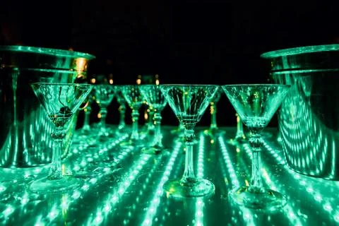 Empty glasses of alcoholic drinks for a slumber party Stock Photos