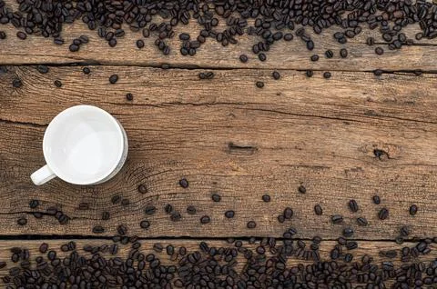Empty glasses and coffee beans On the desk View on top Stock Photos