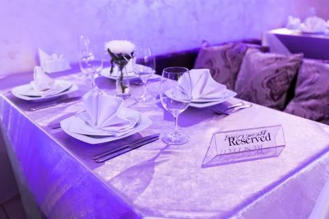 Empty glasses and dishes set in an interior new luxury restaurant with covered 스톡 사진