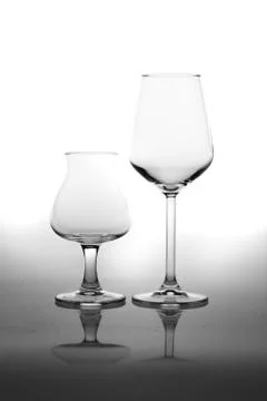 Empty Glasses and Reflection Isolated on White Stock-Fotos