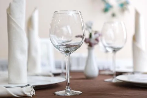 Empty glasses are installed in the restaurant on the table. Part of the inter Stock Photos
