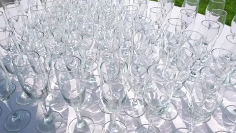 Empty glasses arranged on a table in the restaurant, cafe, or bar Stock Footage 288406432