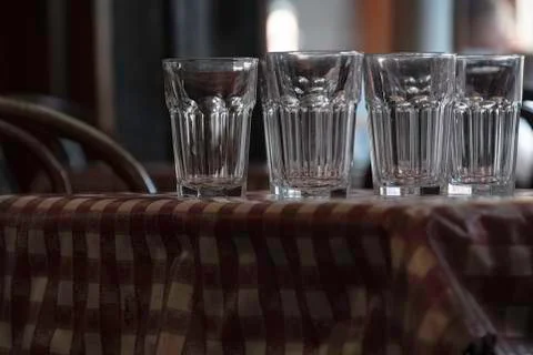 Empty glasses on a banquet table close-up Stock Photos