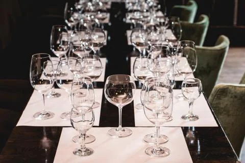 Empty glasses of different shapes served for a wine tasting Stock Photos