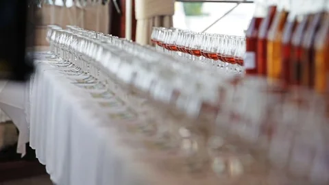 Empty glasses lined up in a row Stock Footage 69960002