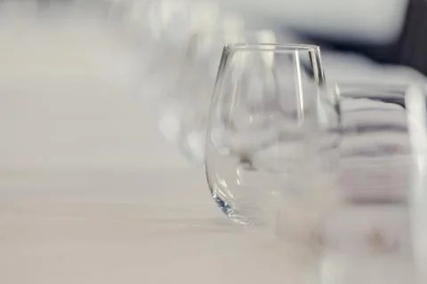 Empty glasses in restaurant. Cutlery on the table in a restaurant table setting, Stock Photos