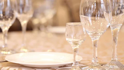 Empty glasses set, fork, knife served for dinner in restaurant 스톡 동영상 96083796