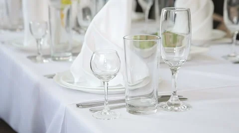 Empty glasses set in restaurant Stock Footage