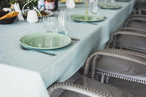 Empty glasses set in restaurant. Part of interior Stock Photos
