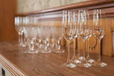 Empty glasses, standing on the table in the restaurant. Empty wine glasses. A Stock Photos