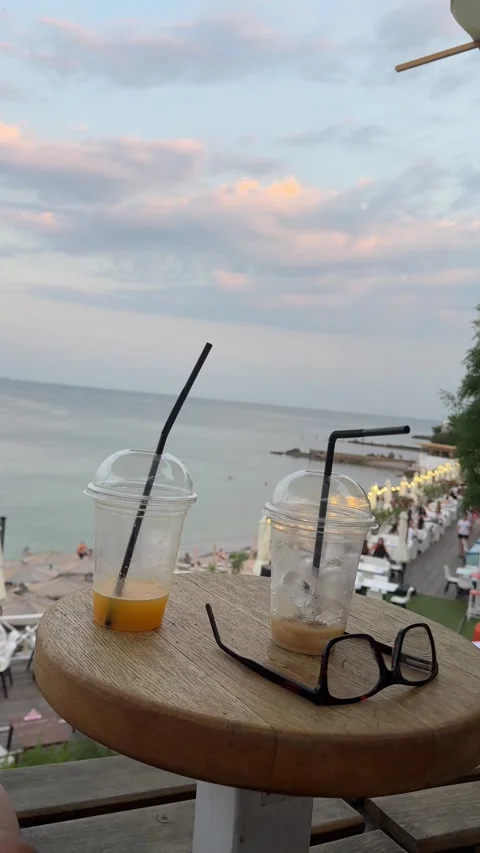 Empty glasses on table at seaside cafe Buffet in Odesa Stock Footage 339731107
