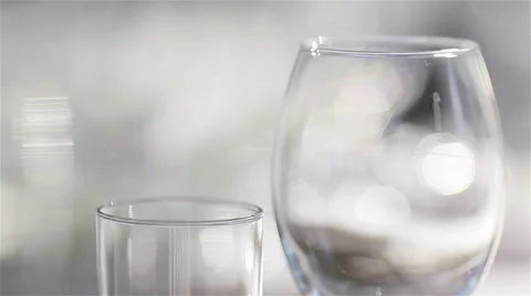Empty glasses for wine and water set on a festive table in a restaurant Video stock 62193098