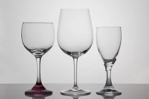 Empty glasses of wine on white background Stock Photos